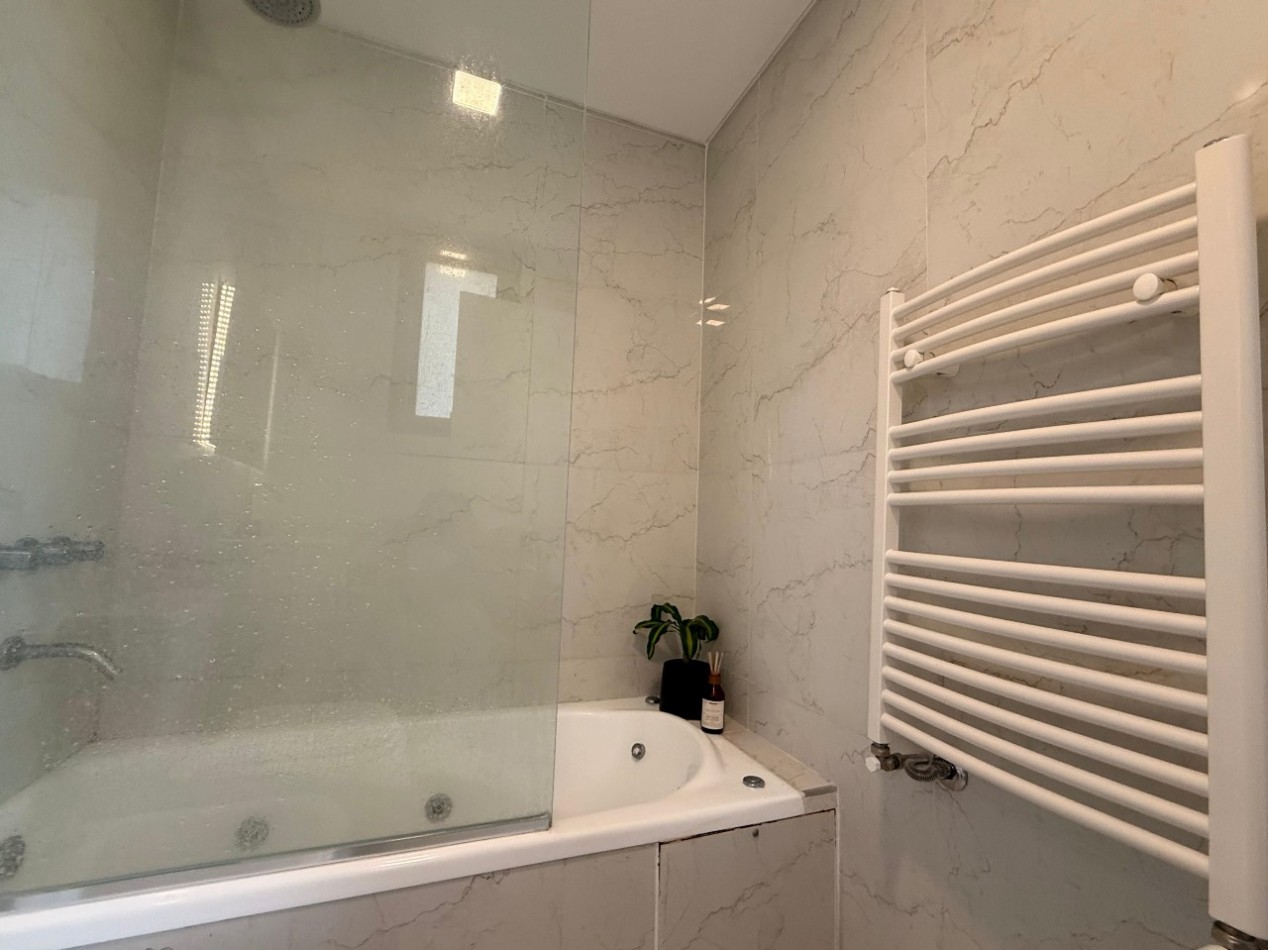 VENTA SEMIPISO DE 2 AMBIENTES CON COCHERA
