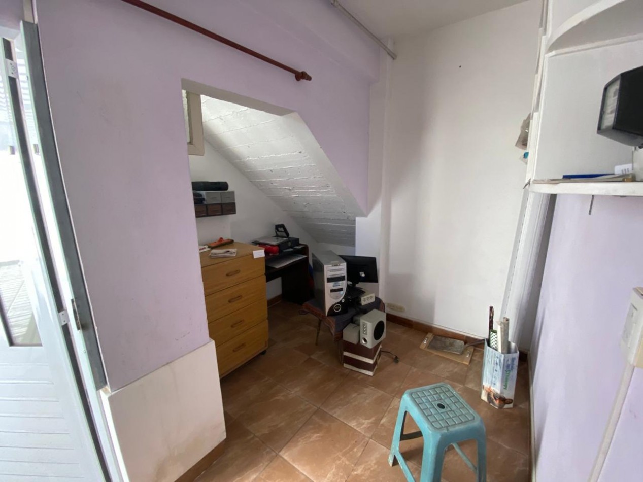 casa con local a la venta