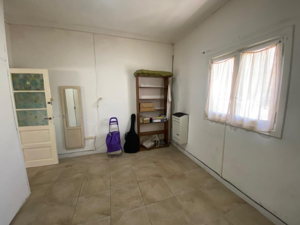 casa con local a la venta