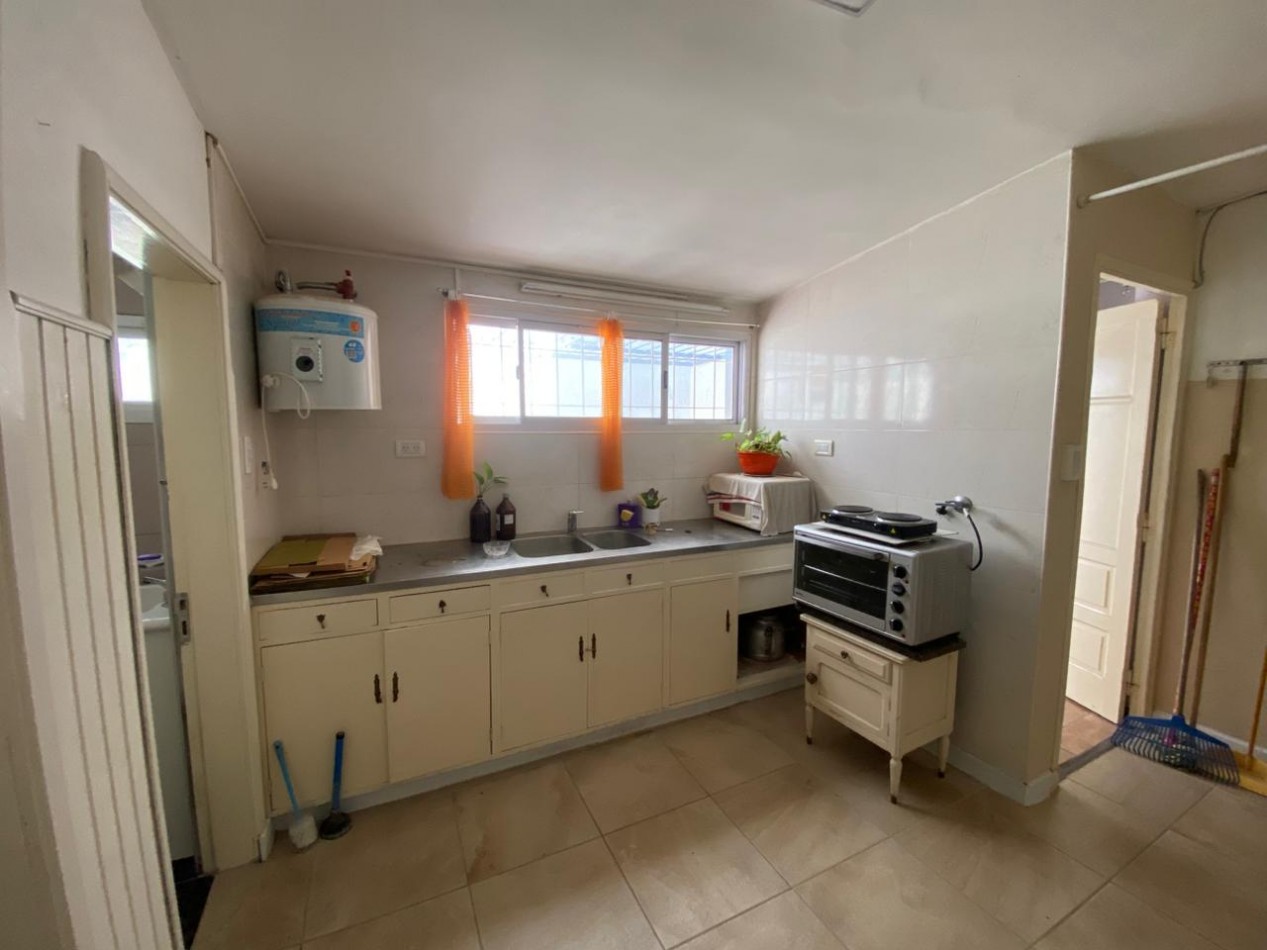 casa con local a la venta